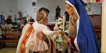 La festividad de la Candelaria volvió a llevar a los recién nacidos ante la Virgen del Buen Fin