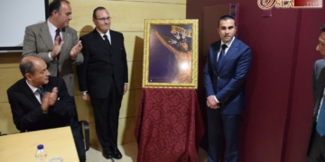 Una imponente fotografía del Cristo de la Vera-Cruz ilustra el cartel de su cuadrilla
