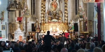 La Banda del Nazareno llenó Omniun Sanctorum con un concierto cofrade muy variado